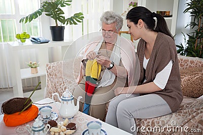 Grandma`s knitting technique Stock Photo