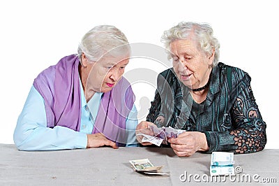 Grandmas are counting money. Stock Photo