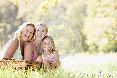 Grandmother with adult daughter and grandchild Stock Photo