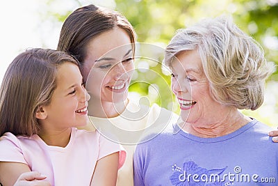 Grandmother with adult daughter and grandchild Stock Photo
