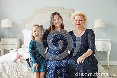 Grandmother, adult daughter and little granddaughter Stock Photo