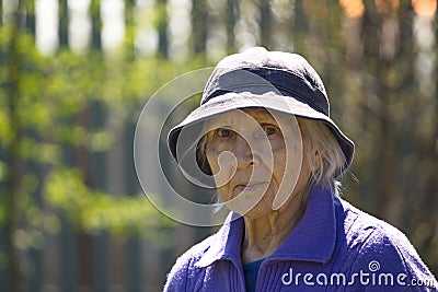 Portrait of a grandmother in nature. Stock Photo