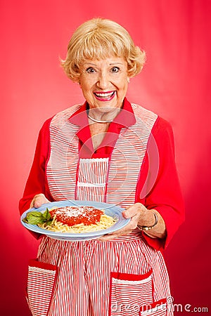 Grandmother Cooks Italian Spaghetti Stock Photo