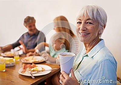 Grandmother, family and smile for breakfast with happiness in morning for bonding with conversation, support and care Stock Photo