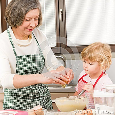 Grandmother and granddaughter baking cookies Stock Photo