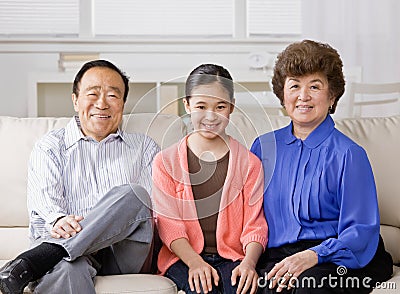 Grandmother, grandfather and granddaughter Stock Photo