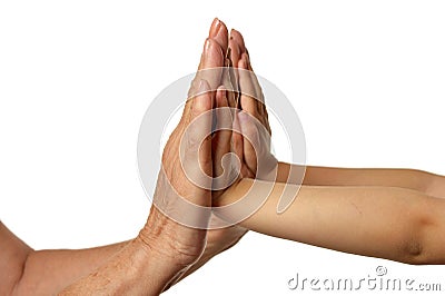 Grandmothers hands with little girl hands isolated on white background Stock Photo