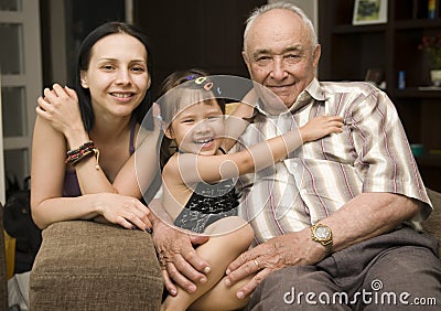 Grandpa and grand daughters Stock Photo
