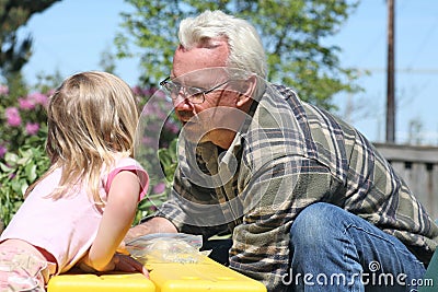 Grandpa and Granddaughter Stock Photo