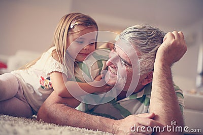 Grandpa with his granddaughter. Stock Photo