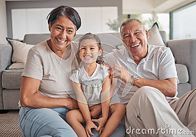 Grandparents, girl and floor in house, smile and playing while in bonding together. Grandmother, grandpa and child on Stock Photo