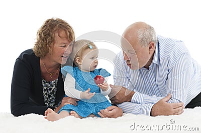 Grandparents with granddaughter, isolated on white Stock Photo