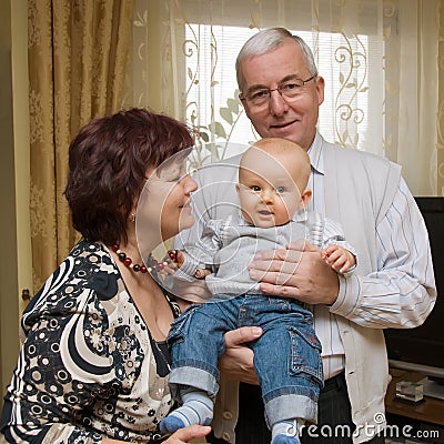 Grandparents with grandson Stock Photo