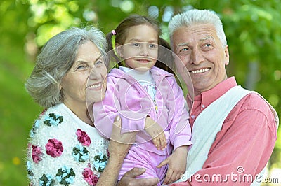 Grandparents with her granddaughter Stock Photo