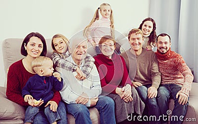 Grandparents 60-70 years old with children are photographing best moments Stock Photo