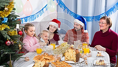 Grandparents 60-70 years old with children are talking to each other Stock Photo