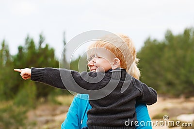 Grandson having fun in nature Stock Photo