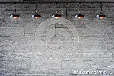 Granite stone decorative brick wall with lamp Stock Photo