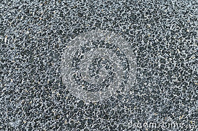 Granite texture dark dot speck stone. Stock Photo