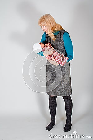 Granny Holding a newborn baby Stock Photo
