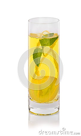 Grape cocktail with mint on a white background. Sweet drink with juicy berries. A glass of yellow grape juice. Stock Photo