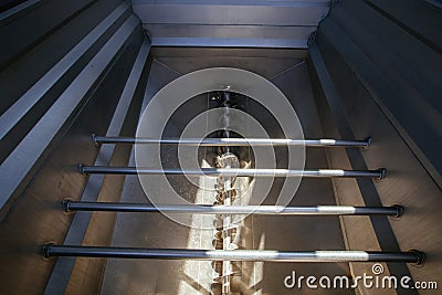 Grape hopper with auger in modern winery Stock Photo