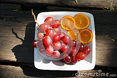 Grape and slice oranges Stock Photo