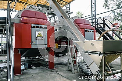 Grape sorter and press in winery Stock Photo