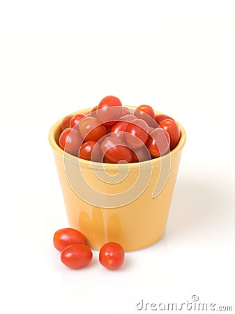 Grape Tomatoes in Gold Pot Stock Photo