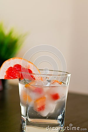 Fruit in ice cubes in water Stock Photo