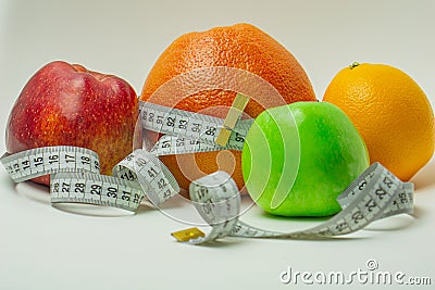 grapefruit tied with measuring tape with fruit. Stock Photo