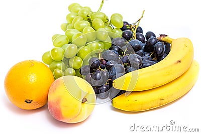 Grapes, peaches, bananas and orange Stock Photo