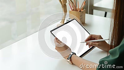 Graphic designer draw a digital tablet at office studio Stock Photo