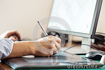 Graphic designer using digital tablet Stock Photo