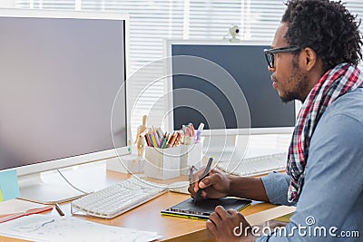 Graphic designer using a graphics tablet Stock Photo