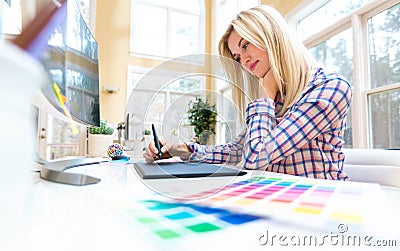 Graphic designer using her graphic tablet Stock Photo