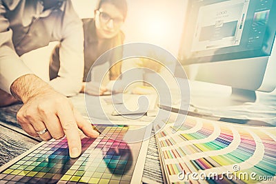 Graphic designer at work. Color samples. Stock Photo