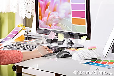 Graphic designer at work. Color samples. Stock Photo