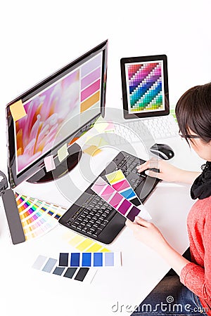 Graphic designer at work. Color samples. Stock Photo