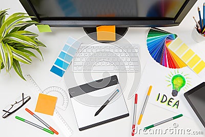 Graphic designer at work. Color samples. Editorial Stock Photo