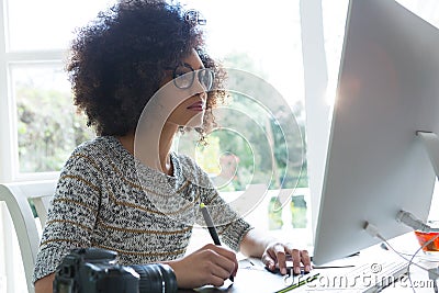 Graphic designer working on desktop pc Stock Photo