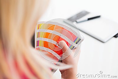 Graphic designer working with pantone palette Stock Photo