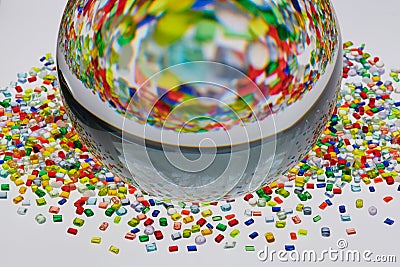 graphic picture of multicolored plastic resin granulates Stock Photo