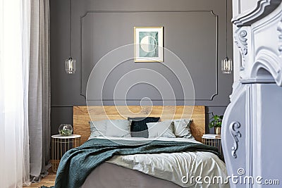 Graphic on the wall decorated with molding in a bedroom interior Stock Photo