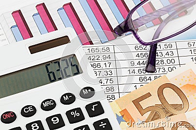 Graphics calculator and a balance sheet Stock Photo