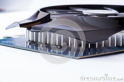 Graphics card with connectors of a different output interfaces and equipped with heat sink without fan on a light Stock Photo