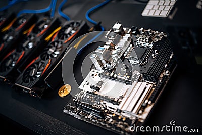 Graphics cards mining rig, details of motherboard slots and components. Bitcoin and blockchain technology. Modern details Stock Photo