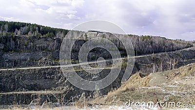Graphite quarry. Open pit mining of graphite Stock Photo