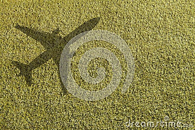 Grass with airplane shadow Stock Photo