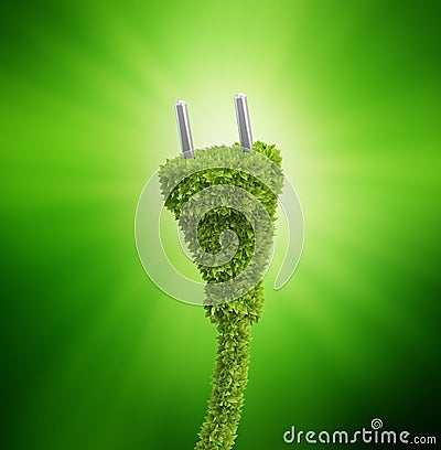 Grass covered electrical plug Stock Photo